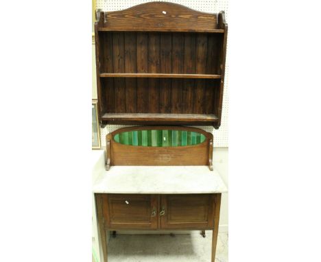 An Edwardian wash stand, the tiled splashback above a marble top above two drawers raised on square tapering legs, together w