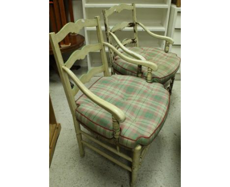 A set of six painted ladder back rush seated dining chairs, together with a pair of painted cane dining chairs CONDITION REPO