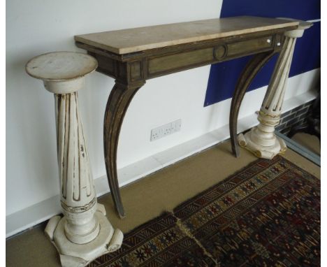 A modern marble top console table with swept legs, together with a pair of white painted torcheres in the distressed manner a