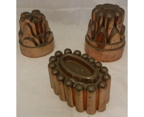 Three Victorian copper jelly moulds to include a mould stamped "22", another mould stamped "8" and an oval mould CONDITION RE