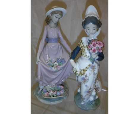 A Lladro figurine of "A Spanish girl with bouquet of flowers", marked "1304" to base, together with a Lladro figurine of "Gir