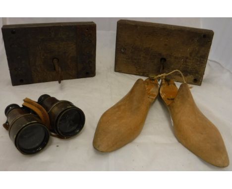 Two vintage door locks, a pair of vintage binoculars and two beech shoe trees