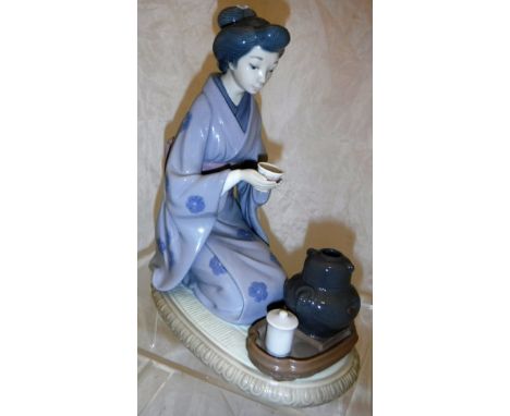 A Lladro figurine "The Tea Ceremony", No'd. 5122 to base