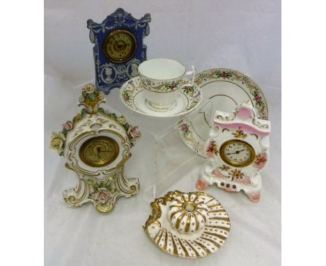 A collection of four porcelain bodied mantle clocks, assorted part tea wares, an inkwell in the form of a shell and a Japanes