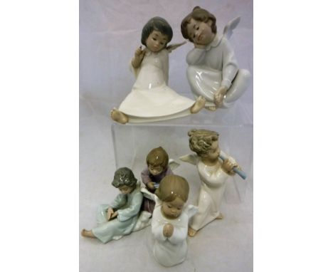 A collection of eight assorted Lladro figurines of cherubs (8)
