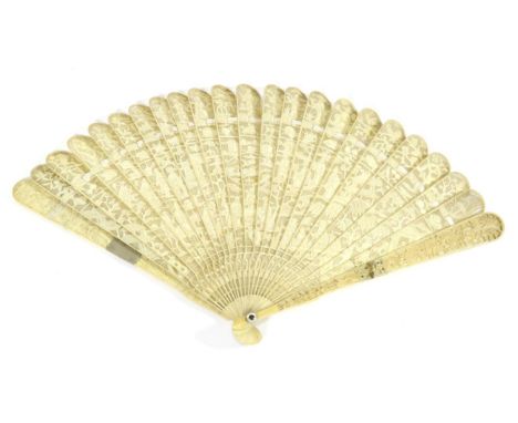 A Circa 1830's Chinese Carved Ivory Brisé Fan, Qing Dynasty, a small central oval containing boats and buildings. Twenty one 