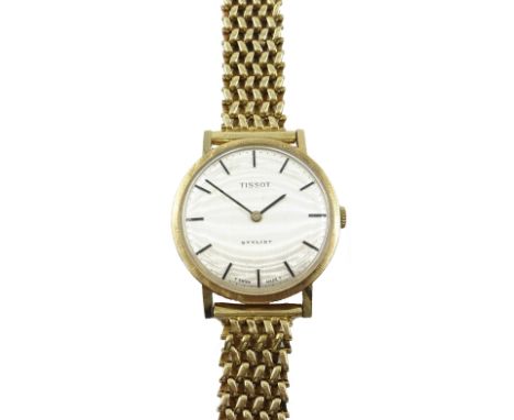 Tissot Stylist 9ct gold Gents wrist watch with baton numerals, on articulated strap, presentation dated 1973 Condition Report