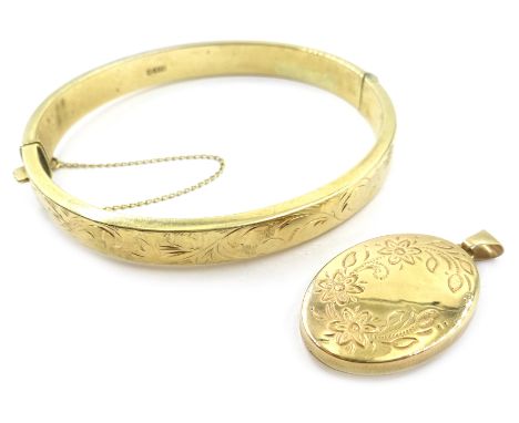 Gold hinged bangle and a hinged locket, both hallmarked 9ct Condition Report Approx 15gmClick here for further images, condit