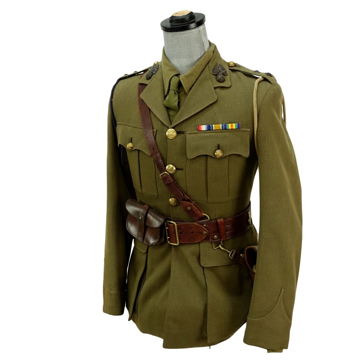 Vintage World War II Era Military Uniform Displayed On Mannequin