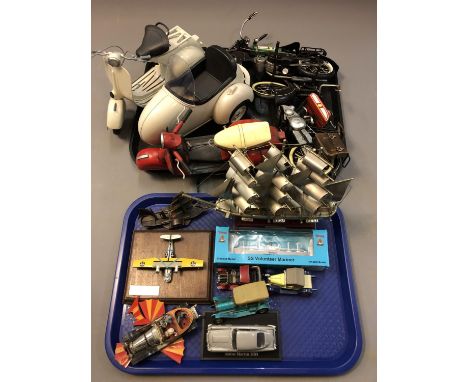 A collection of die cast cars and motorbikes Corgi Chitty Chitty Bang Bang, model ship 'Marco Polo' etc. (Two trays)