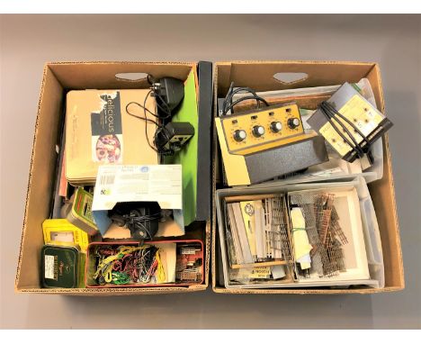 A large quantity of parts and accessories for model railway building; cabling, transfers, scenery etc. (Two boxes)