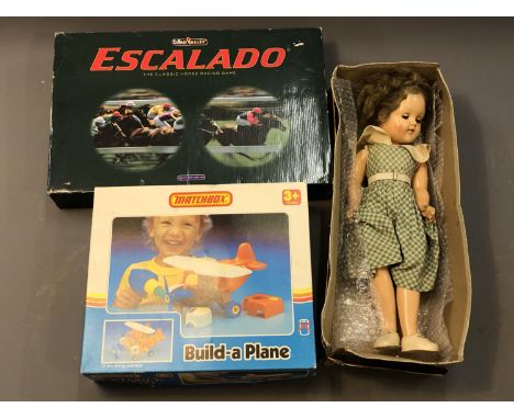 A Chad Valley Escalado game in box, Matchbox Build a Plane and a Pedigree Veronica Scott Dressmaking Doll. (3)