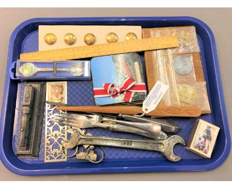 A quantity of collectable relating to trains; LNER spanner and brass buttons, railway tokens, die cast model Flying Scotsman,