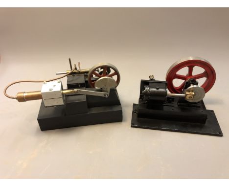 A live steam piston engine, length 25cm, together with another similar. (2) 