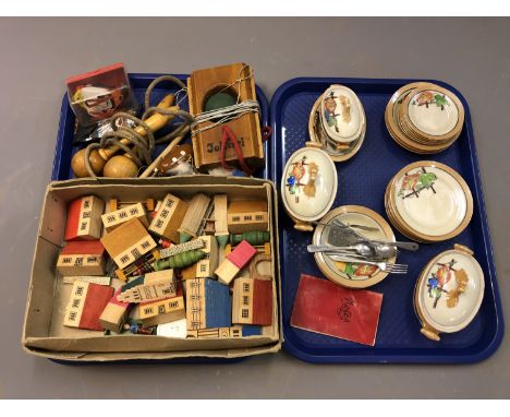 A vintage Jokari Junior child's ball game, skipping rope, wooden model village, child's dinner set etc (Two trays)