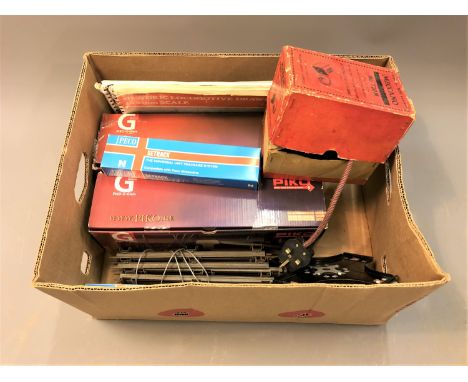 A box of Piko and Peco railway track, model rail plan book, book of locomotive drawings, Hornby Meccano transformer Type T20M