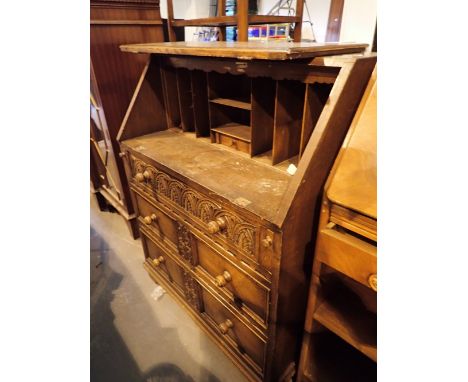 Vintage dropfront bureau three lower drawer with carved front and interior shelving 