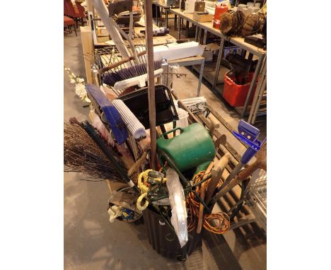Quantity of garden tools watering cans electrical extensions etc  CONDITION REPORT: The bin the items are displayed in is not