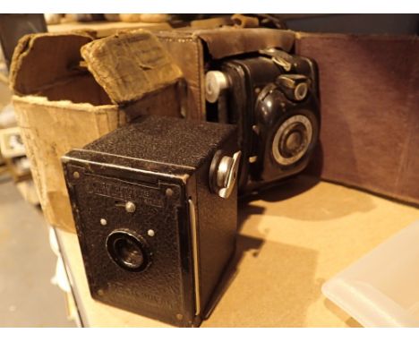 Kodak Hawkeye Ace camera and a vintage leather cased Robi camera 1.11 F10.5