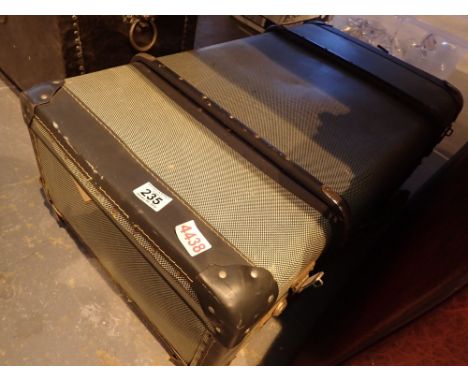 Vintage suitcase with blanket contents