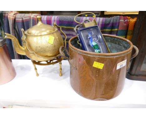 Brass kettle on brass trivet, copper bucket containing key holder, letter opener, brass thermometer and brass spoon