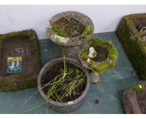 Two composite garden birdbaths or planters and similar planter  