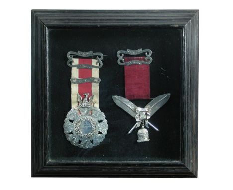 A 19th century engraved Masonic PCN presentation badge c.1873 from the Father Mathew Lodge, framed alongside another with rib
