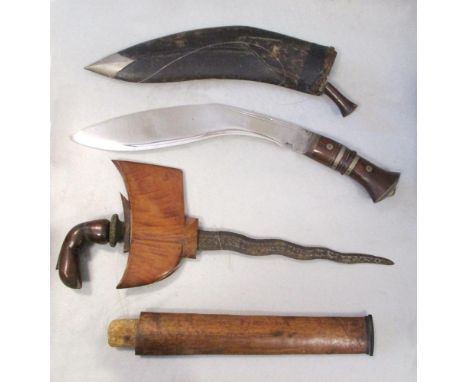 A Malaysian kris, with wooden scabbard, and plain form deity grip, together with a mid 20th century Kukri  