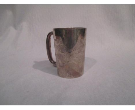 A silver pint mug bearing 1944 inscription, with Bomber Squadron crest above 'Presented to G/Capt W. M. L. MacDonald D.F.C by