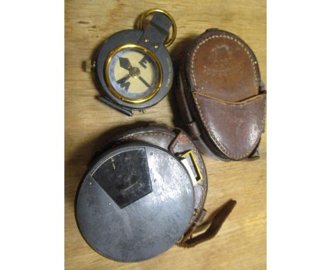 A WWI leather cased compass, together with a WWI leather cased clinometer a/f  