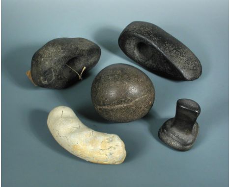 A collection of five Neolithic stone tools to include a large stone axe hammer with drilled short shaft hole and tapering sid