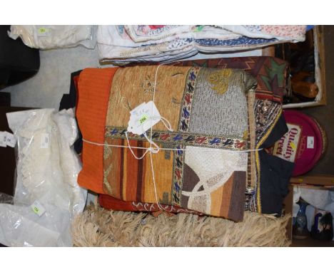 Two Middle Eastern / North African throws and an embroidered wall hanging, to include a printed cotton throw/bedspread, appro