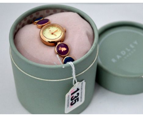 RADLEY, A ladies fashion watch with rose gold coloured metal and purple, green and cream enamel detail, within original box 