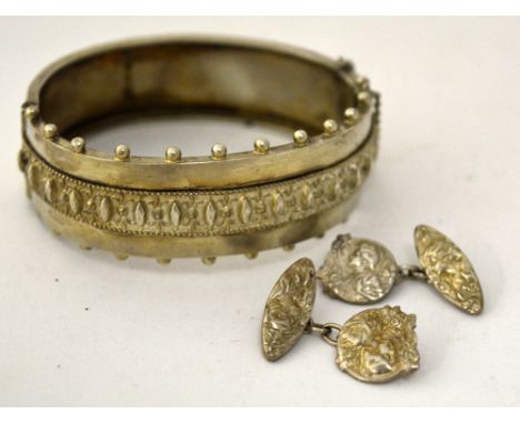 TWO ITEMS OF JEWELLERY, to include a silver clasp bangle and a pair of Art Nouveau style cufflinks