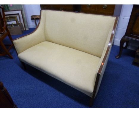 A TWO SEATER SOFA, with mahogany inlaid frame and lemon upholstery (lacking castors) 