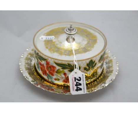 A SILVER PLATE LIDDED CONSERVE CERAMIC POT, with plated stand, together with four stork and landscape engraved design napkin 