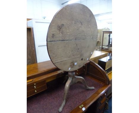 A GEORGIAN CIRCULAR TILT TOP TRIPOD TABLE (for restoration) 