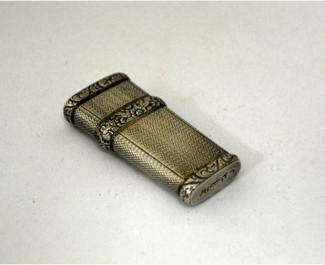 A SILVER ETUI, with engine turned and flower engraving, hallmarks for Birmingham