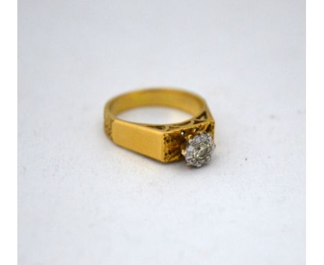 A DIAMOND RING, with single cut diamond to the textured band, estimated total diamond weight 0.20ct 