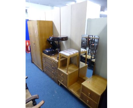 'MEREDEW' LIGHT OAK FOUR PIECE BEDROOM SUITE, comprising dressing table, chest of drawers, a two door wardrobe and a stool 