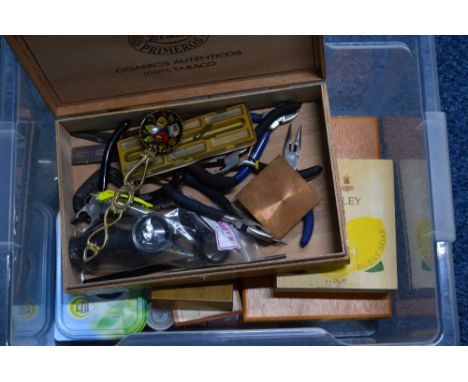 A LARGE BOX OF WATCH REPAIR TOOLS 