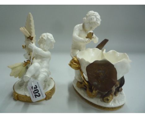 TWO MOORE CERAMIC CHERUBS, both in naturalistic settings (sd) (2) 