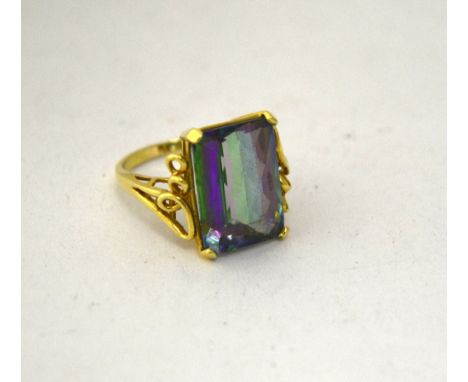 A DRESS RING, with fancy faceted rectangular shape mystic topaz, stamped 14K