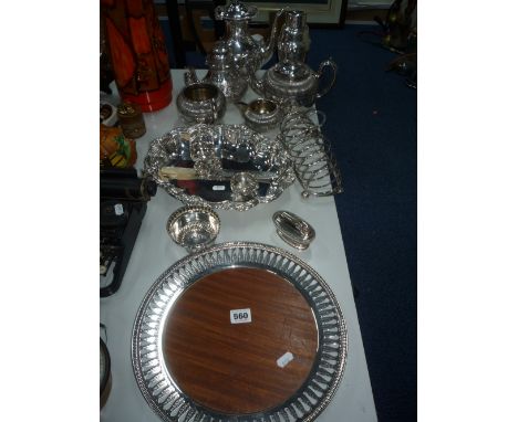 A QUANTITY OF PLATED WARES, to include toast rack, three piece tea service etc 