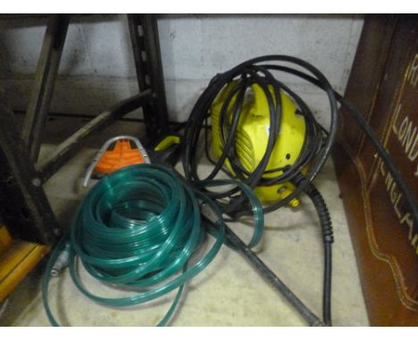 A KARCHER ELECTRIC JET WASHER, a hose pipe, etc (3) 