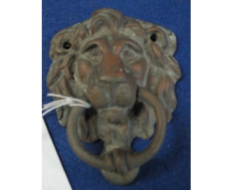 Brass lion mask door knocker. 