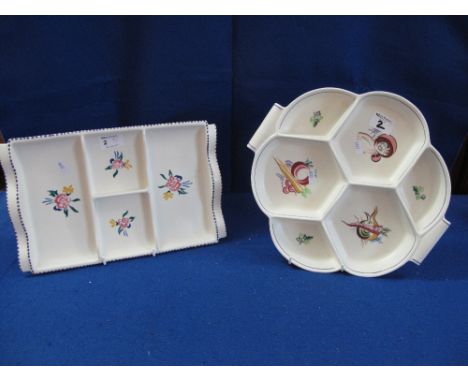 Two Poole pottery hors d'oeuvre dishes with painted floral and vegetable decoration. Printed and painted marks to each. (2) 