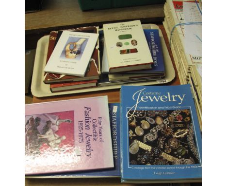 Two trays of assorted books to include 'Costume Jewellery Identification and Price Guide', 'Miller's Encyclopedia of British 