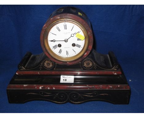 19th century black slate and marble drumhead shaped two train mantle clock, with French brass drum movement, the face marked 