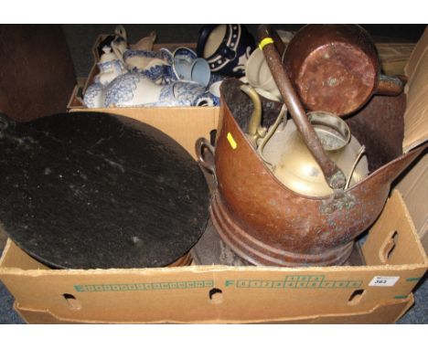 Box of assorted metal ware to include copper coal scuttle, copper kettle, brass kettle, cast iron baking slabs etc. 